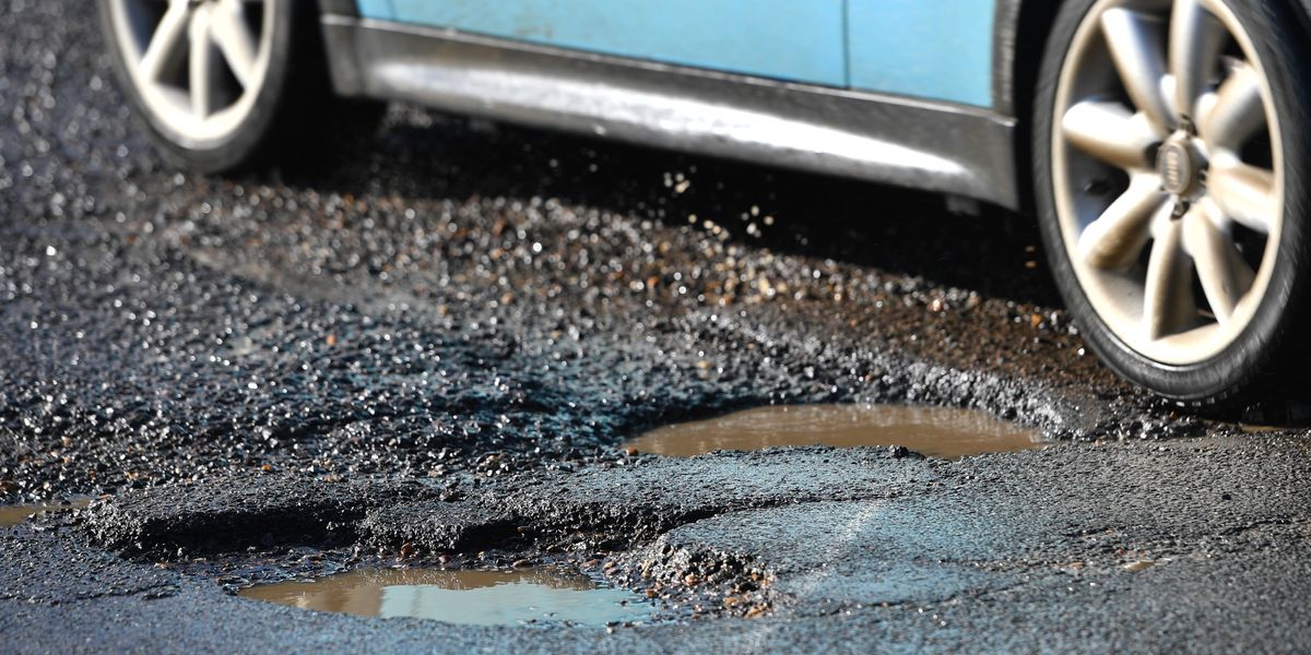 Potholes need to be 30cm wide before local councils fix them
as roads crumble - 'Enormously frustrating!'